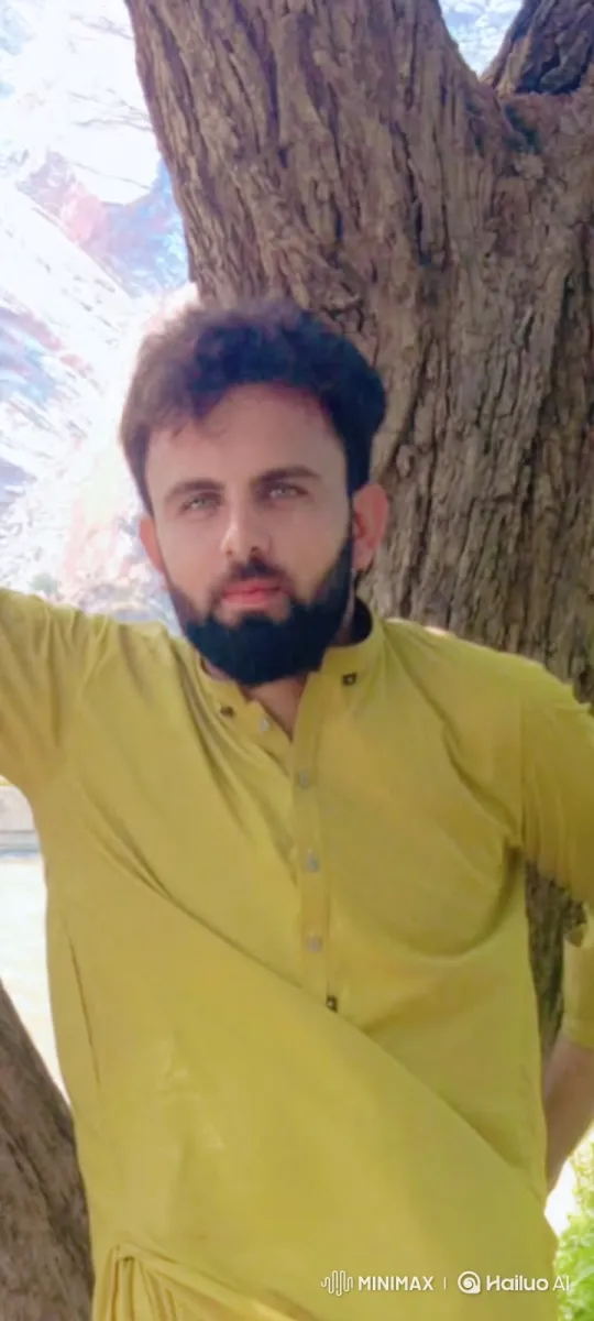 Man with Calm Expression and Gentle Smile in Outdoor Setting – AI Generated Video | Hailuo AI