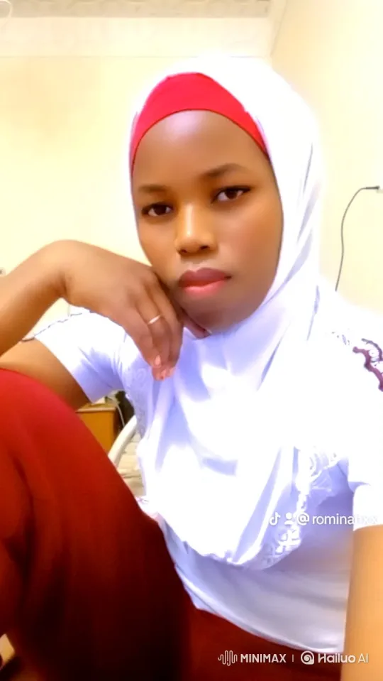 Young Woman Holds Gaze, Softens into Smile – AI Generated Video | Hailuo AI