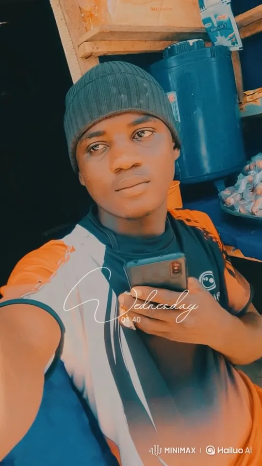Young Man in Beanie Reflects in Shop Setting – AI Generated Video | Hailuo AI
