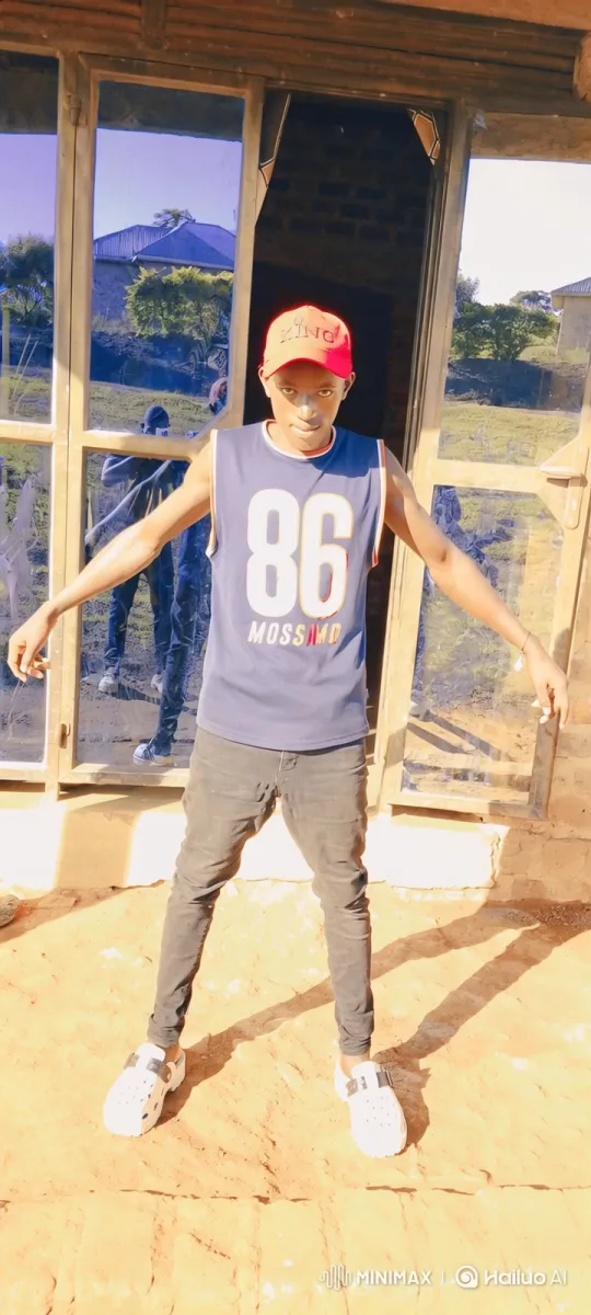 Young Man Poses Confidently in Reflective Building Background – AI Generated Video | Hailuo AI