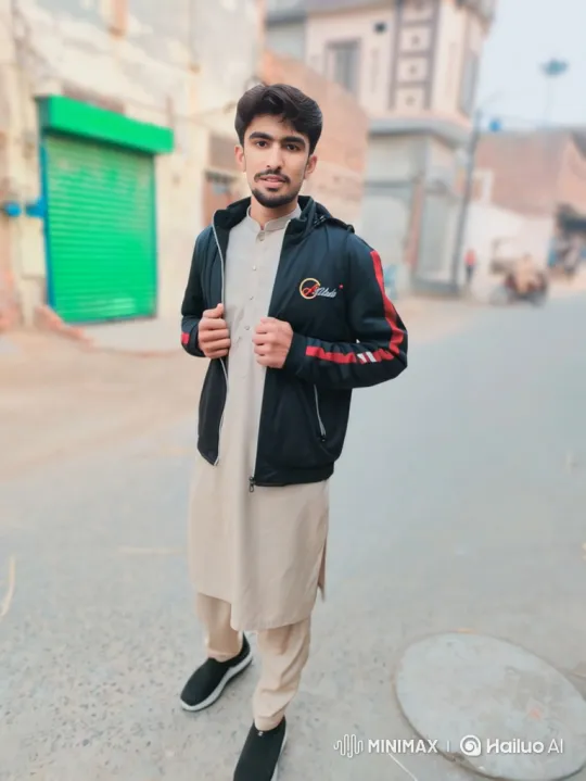 Young Man in Striped Jacket Walks Towards Camera – AI Generated Video | Hailuo AI