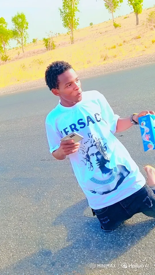 Young Man Receives New Motorcycle on Paved Road – AI Generated Video | Hailuo AI