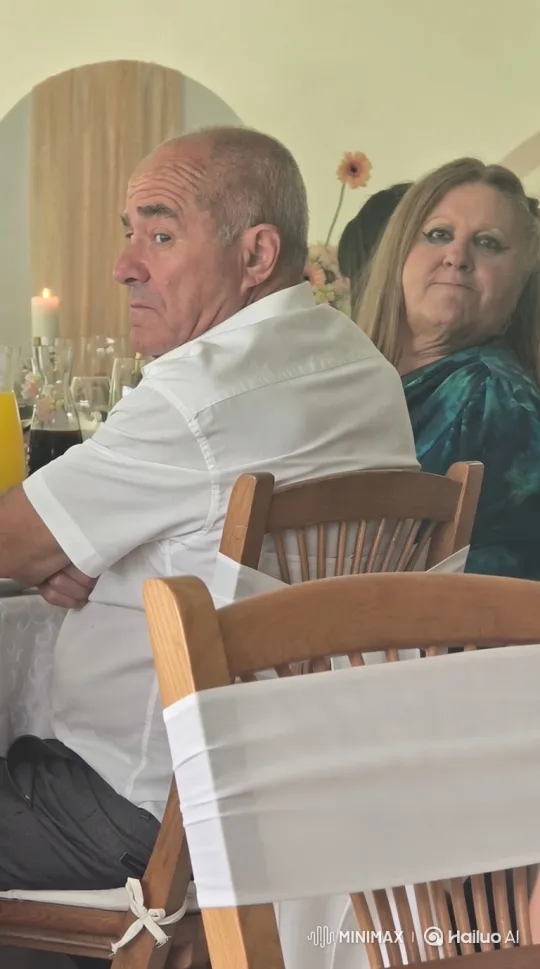 Middle-Aged Couple Shares Tender Moment at Celebration – AI Generated Video | Hailuo AI