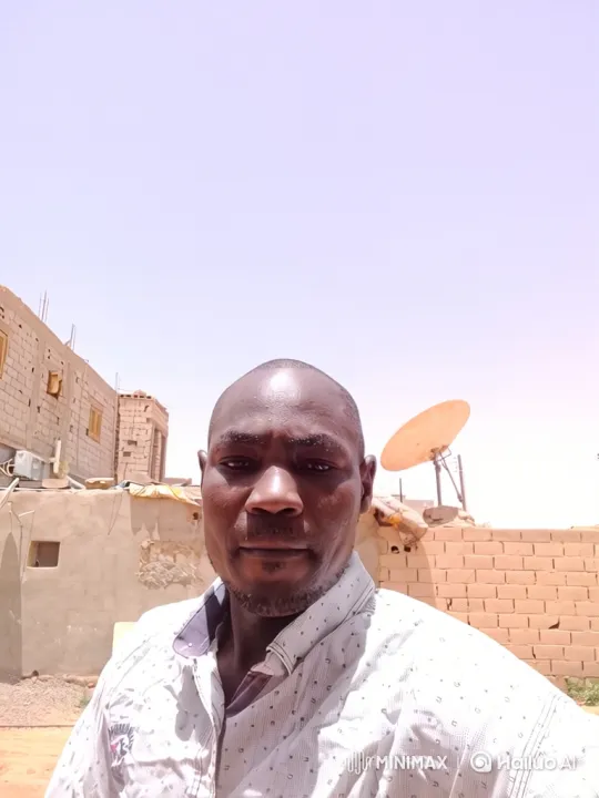 Man in Shirt Filmed Outdoors with Tracking Shot – AI Generated Video | Hailuo AI