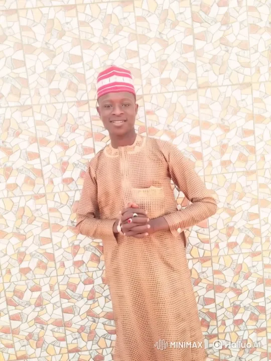 Young Man in Mosaic Backdrop with Gentle Smile – AI Generated Video | Hailuo AI