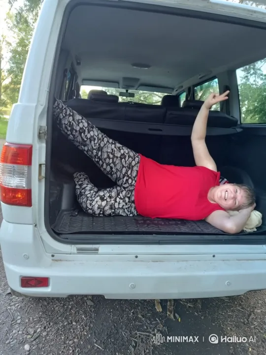 Woman Levitates Out of SUV Trunk in Joyful Dance – AI Generated Video | Hailuo AI