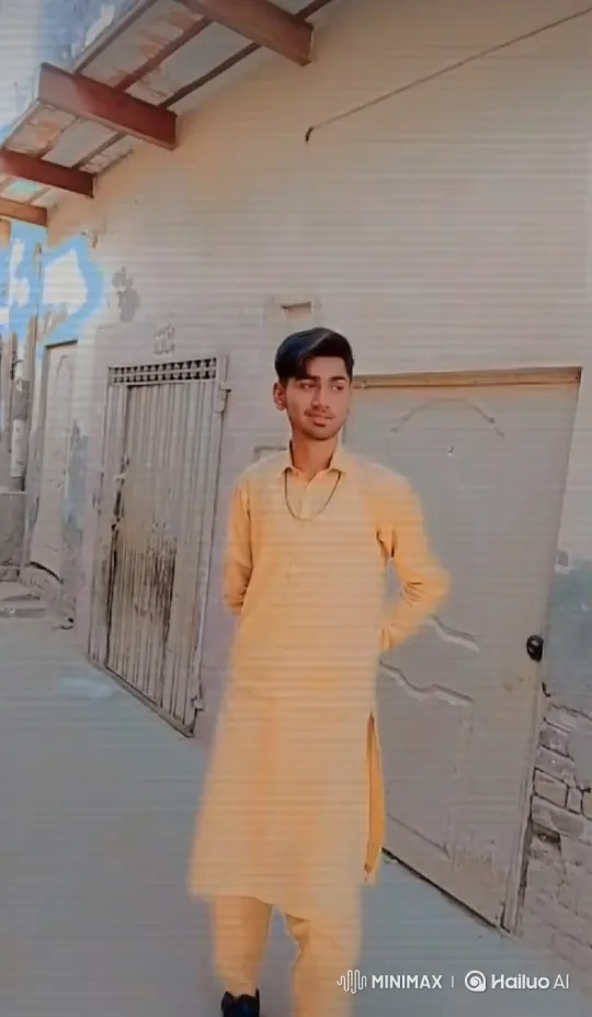 Young Man in Yellow Attire in Quiet Alley – AI Generated Video | Hailuo AI