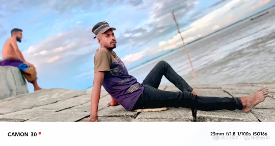 Two Men Fishing by a Calm River – AI Generated Video | Hailuo AI