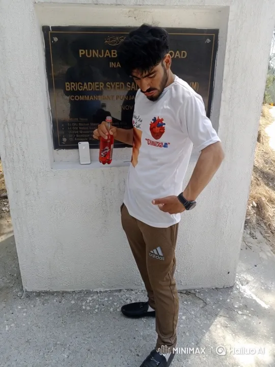 Young Man Sips Beverage by Monument - Close-up Ending – AI Generated Video | Hailuo AI