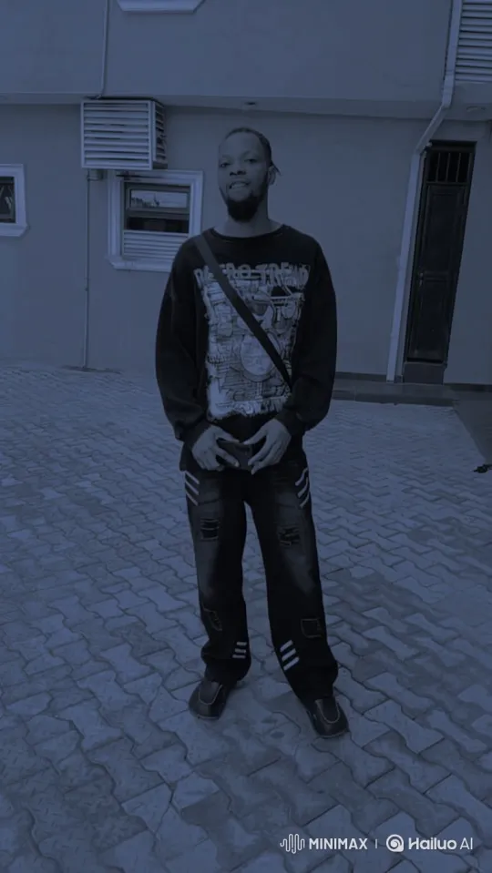 Young Man in Cool Blue Lighted Courtyard – AI Generated Video | Hailuo AI