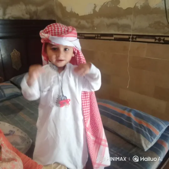 Young Boy Dancing Joyfully on Bed – AI Generated Video | Hailuo AI