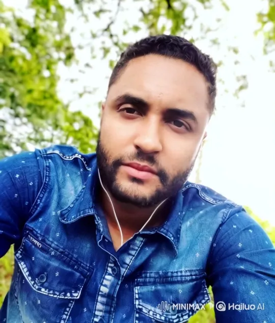 Man Catches Fish Patiently on Riverbank – AI Generated Video | Hailuo AI