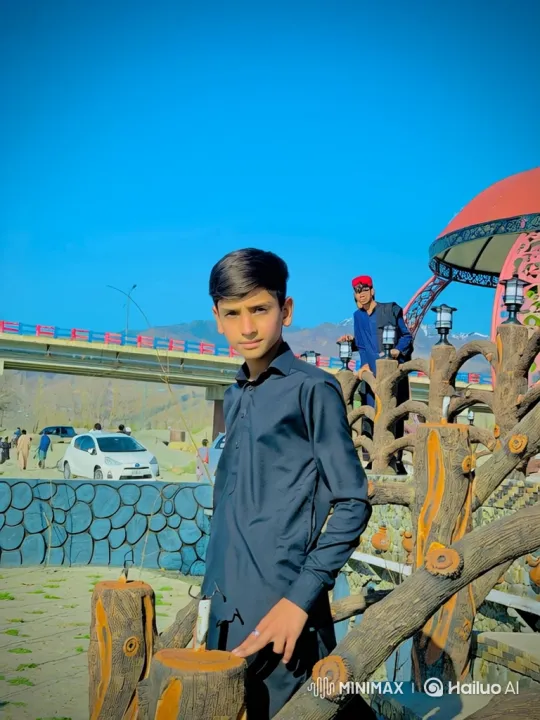 Young Man Observes Car Movement in Scenic Landscape – AI Generated Video | Hailuo AI