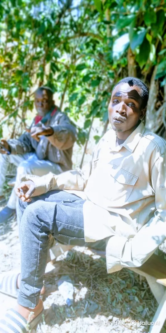 Man Smokes Leisurely in Sunlit Outdoor Scene – AI Generated Video | Hailuo AI