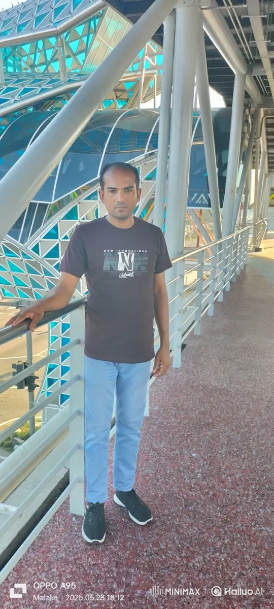 Man Walks Down Modern Melaka Pedestrian Bridge – AI Generated Video | Hailuo AI