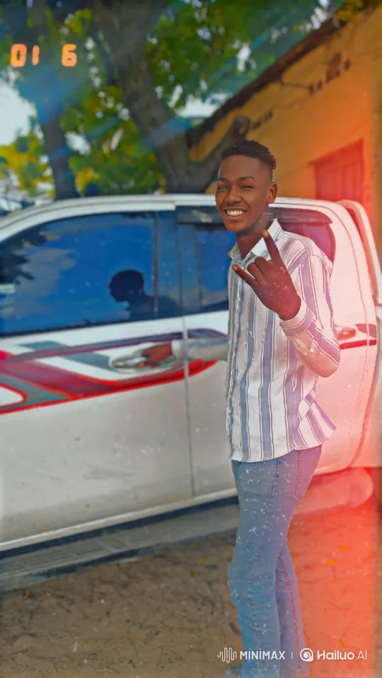 Young Man Smiles, Truck Moves, Camera Closes In – AI Generated Video | Hailuo AI