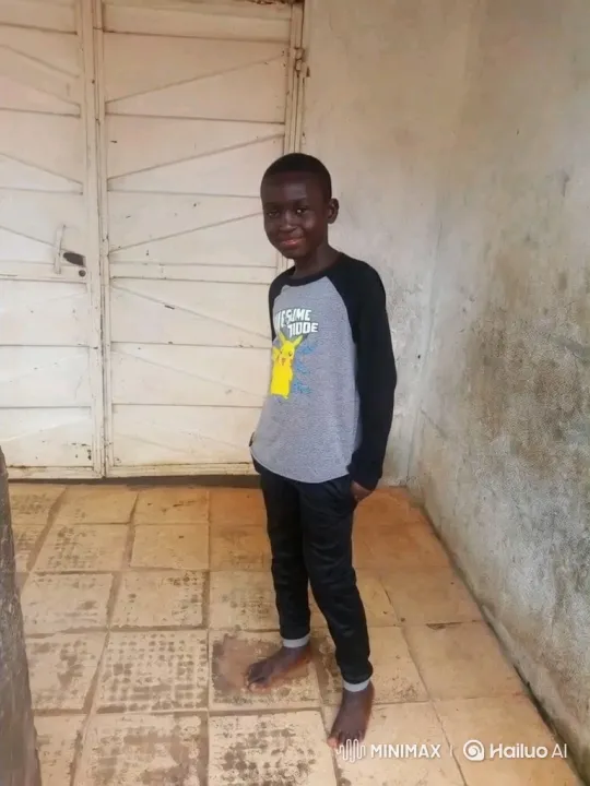 Young Black Boy Stands Barefoot on Patio – AI Generated Video | Hailuo AI