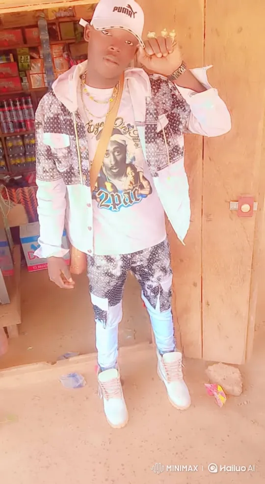 Young Man Poses and Walks Confidently Out of the Frame – AI Generated Video | Hailuo AI