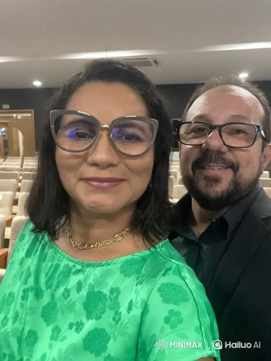 Couple Shares Intimate Moment in Auditorium Selfie – AI Generated Video | Hailuo AI