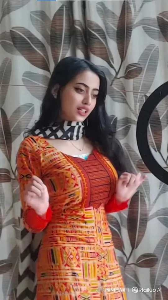 Woman Presses Chest, Moves Forward, Maintains Gaze – AI Generated Video | Hailuo AI
