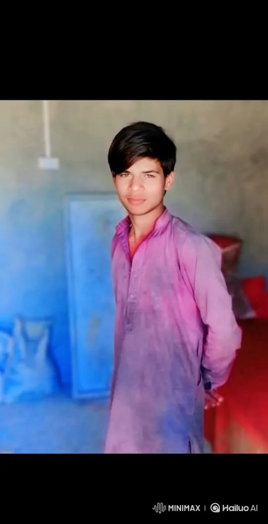 Young Man in Gentle Smile Pose with Soft Lighting – AI Generated Video | Hailuo AI