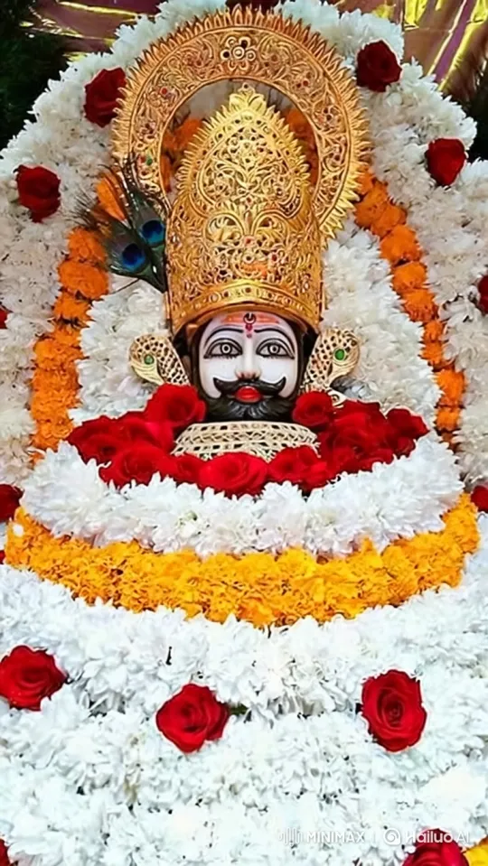 Reverent Zoom-In on Ornate Deity Statue with Swaying Feather – AI Generated Video | Hailuo AI
