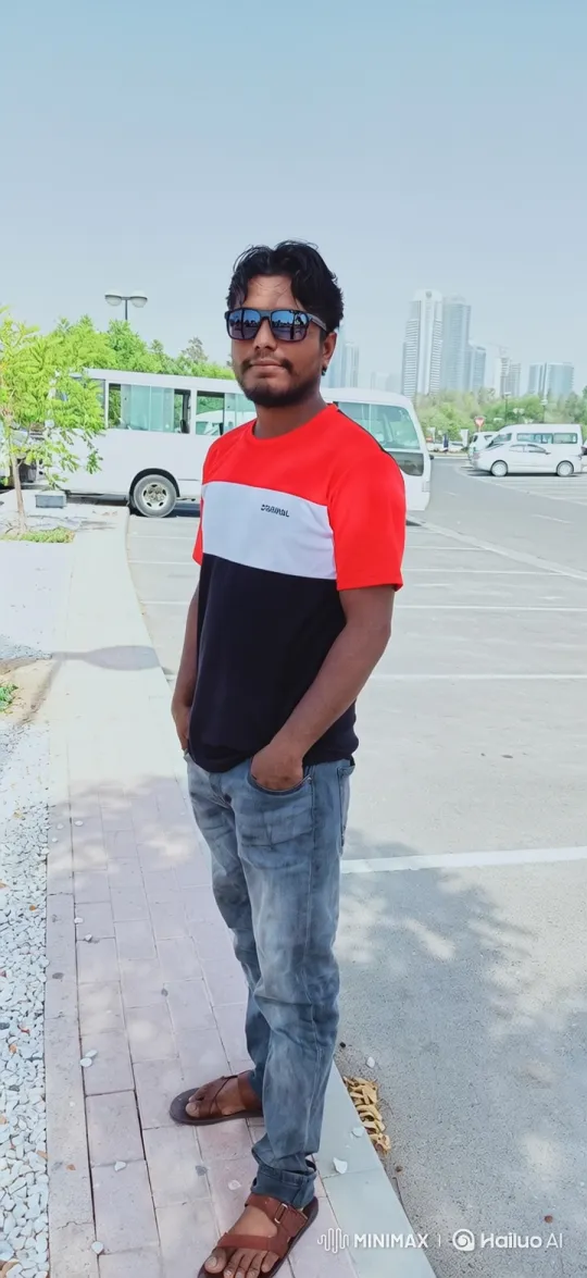Casual Man Stands Still Amidst Gentle Breeze on Sunny Day – AI Generated Video | Hailuo AI