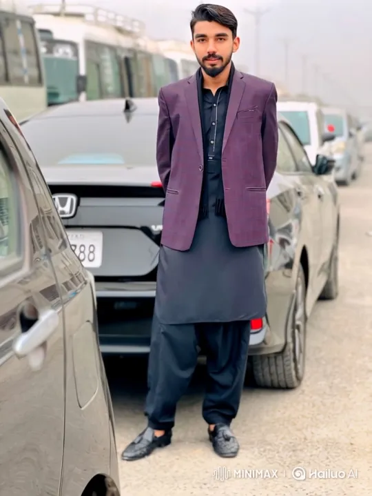 Young Man in Dark Attire with Gentle Smile – AI Generated Video | Hailuo AI