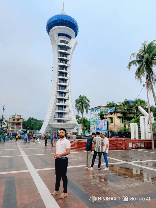 Man in Plaza with Tower: Cinematic Camera Movement – AI Generated Video | Hailuo AI