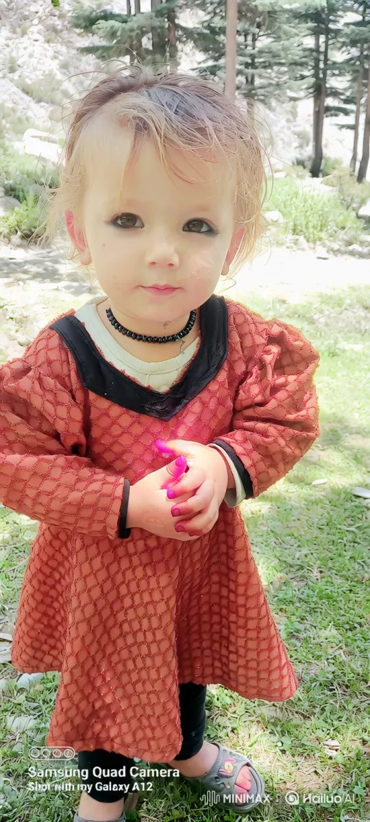 Curious Child in Woods Examines Stained Hands – AI Generated Video | Hailuo AI