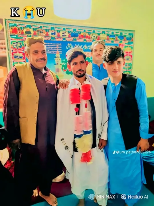 Four Men Pose in Bright Room with Warm Smiles – AI Generated Video | Hailuo AI