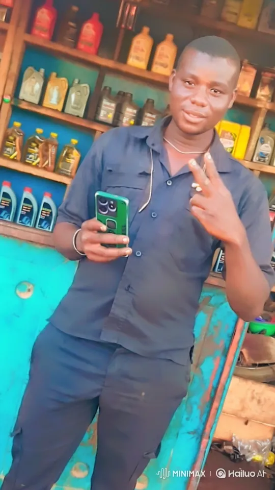 Young Man in Auto Parts Store with Truck Departure – AI Generated Video | Hailuo AI