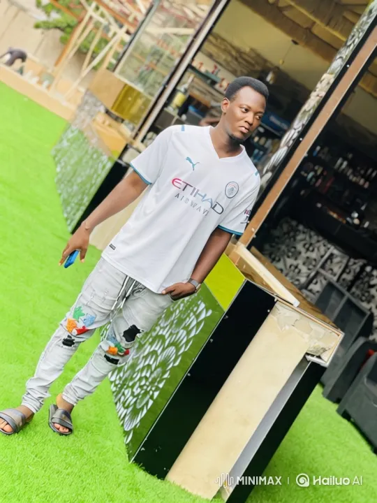 Young Man Prepares to Drive Luxury Sedan on Artificial Turf – AI Generated Video | Hailuo AI