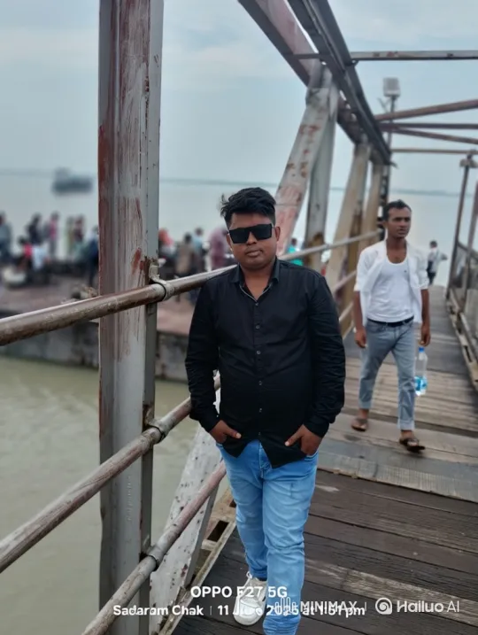 Young Man Stands on Weathered Pier, Observes Scenic Calmness – AI Generated Video | Hailuo AI