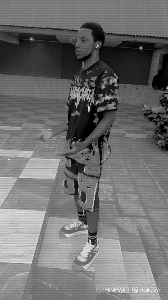 Young Man in Distinctive Outfit on Patio: Tracking Shot – AI Generated Video | Hailuo AI