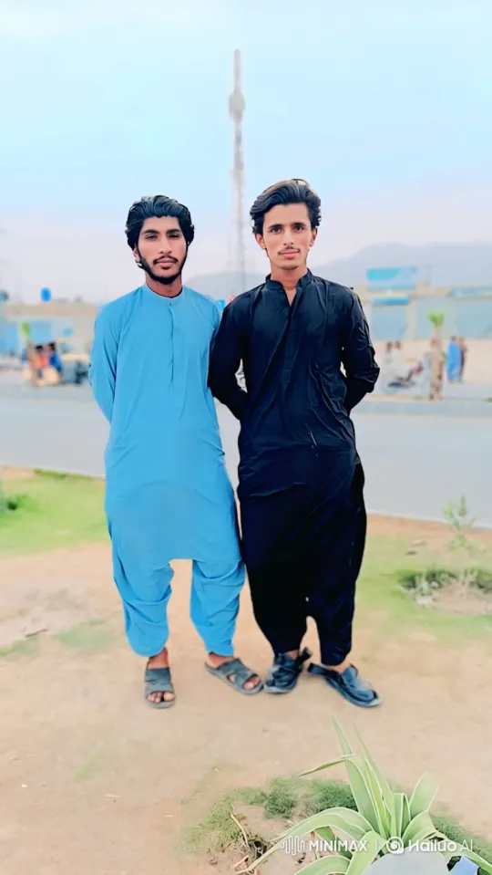 Two Men in Blue and Black Stand Together – AI Generated Video | Hailuo AI