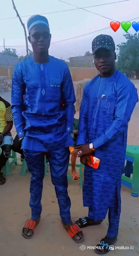 Two Men in Traditional Blue Outfits with Dynamic Camera Movement – AI Generated Video | Hailuo AI