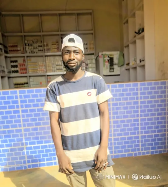 Tranquil Shopkeeper's Serene Gaze – AI Generated Video | Hailuo AI