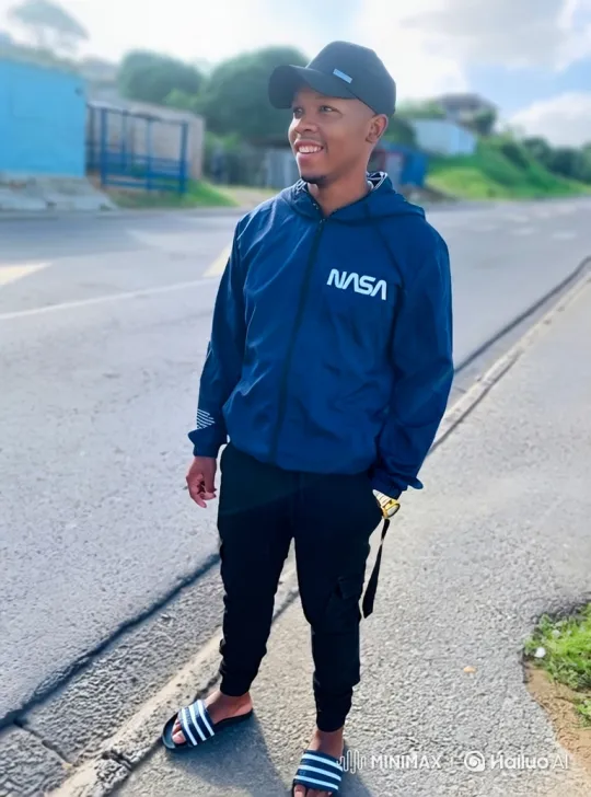 Young Man in NASA Jacket Enters Porsche on Bright Day – AI Generated Video | Hailuo AI