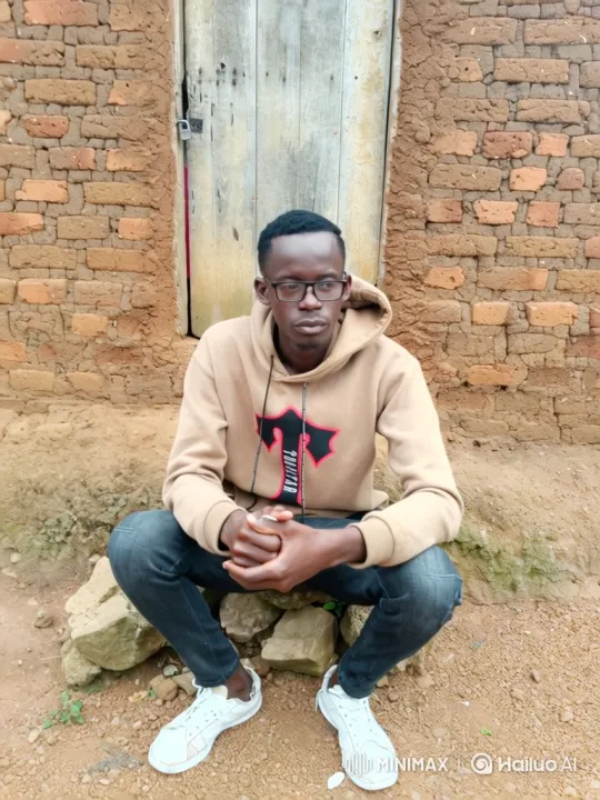 Young Man in Thoughtful Contemplation by Rustic Door – AI Generated Video | Hailuo AI
