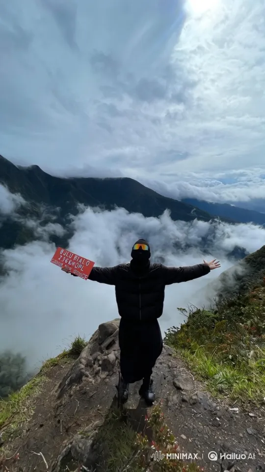 Triumphant Person Embraces Mountain Peak – AI Generated Video | Hailuo AI