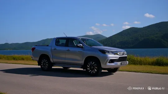 Silver Toyota Hilux Vigo in Scenic Lakeside Setting – AI Generated Video | Hailuo AI