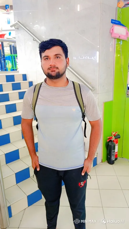 Young Man in Indoor Setting Ascends Staircase – AI Generated Video | Hailuo AI