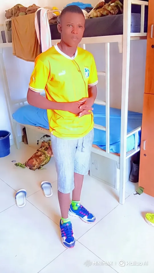 Young Man Poses Confidently in Neatly Organized Room – AI Generated Video | Hailuo AI