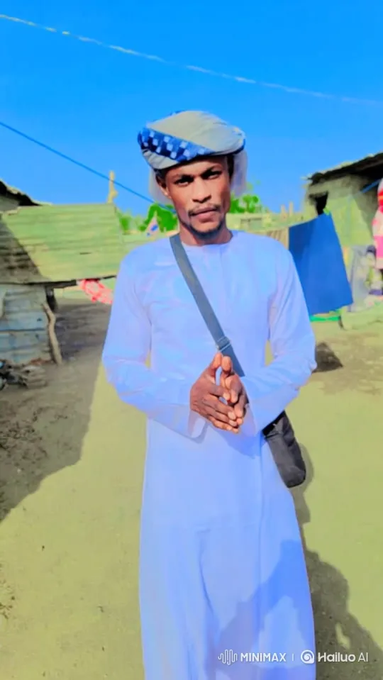 Man in White Robe Stands Still, Gazing at Camera – AI Generated Video | Hailuo AI