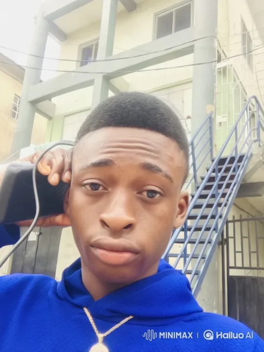 Young Man on Blue Stairs in Live2D Animation – AI Generated Video | Hailuo AI