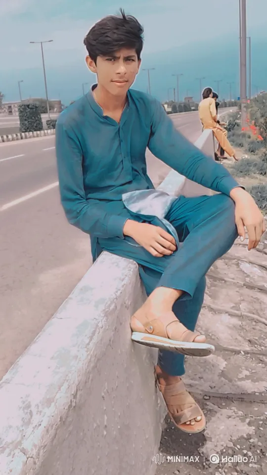 Young Man Watches Lamborghini Drive By on Overcast Road – AI Generated Video | Hailuo AI