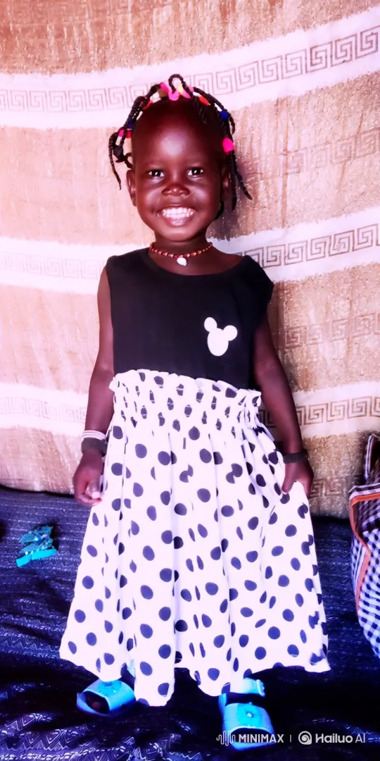 Joyful Black Girl in Polka-Dot Skirt and Beaded Necklace – AI Generated Video | Hailuo AI