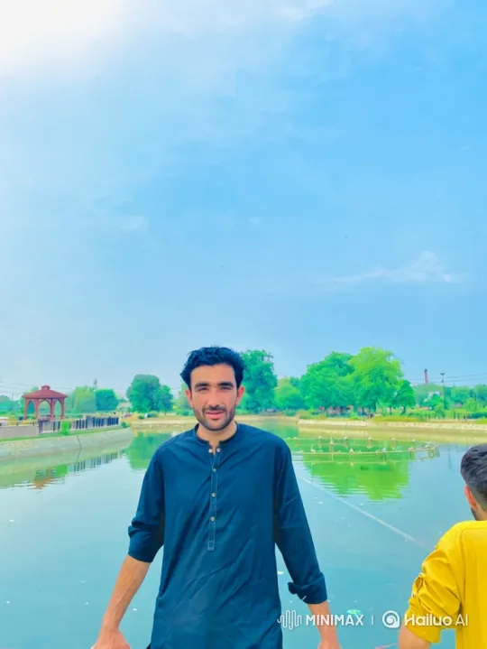 Tranquil Man in Park Setting with Gentle Breeze – AI Generated Video | Hailuo AI