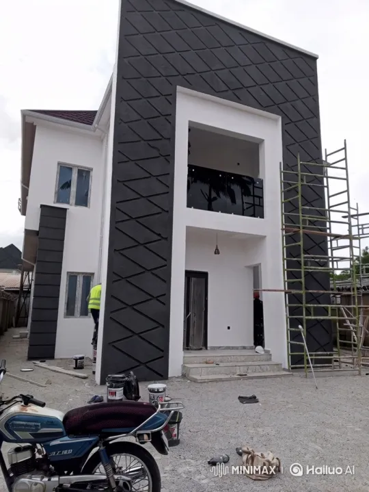 Renovation Scene: Worker Paints Modern House Exterior – AI Generated Video | Hailuo AI